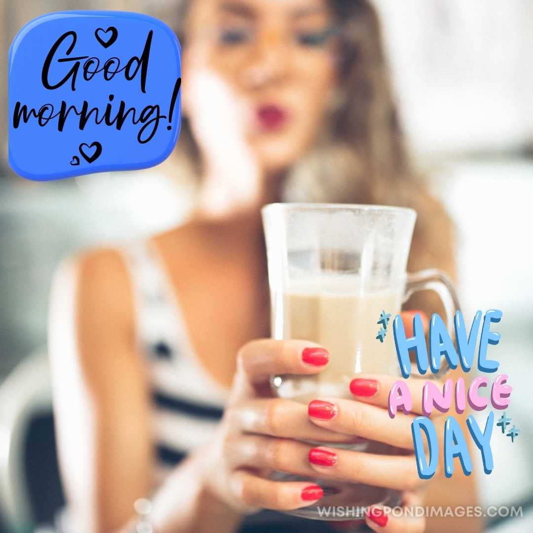 Beautiful young woman drinking coffee at a cafe. Good Morning Coffee Images